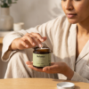 Woman applying Balance high-strength CBD cream from the jar